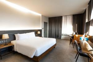 Postel nebo postele na pokoji v ubytování VIYA lodge