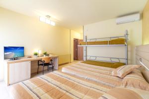 Posteľ alebo postele v izbe v ubytovaní Hotel Sausa