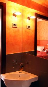 Кровать или кровати в номере I Tre Merli Locanda