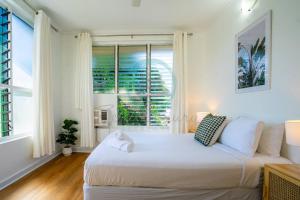 Nightcliff Nest - Stylish 2BR Apt Near Foreshore客房内的一张或多张床位