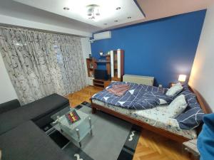 Ένα ή περισσότερα κρεβάτια σε δωμάτιο στο KS Studio