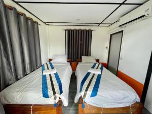 Ein Bett oder Betten in einem Zimmer der Unterkunft Revolution Hostel Pai