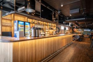 Lounge nebo bar v ubytování Bardufoss Hotell