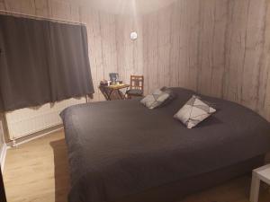 Postel nebo postele na pokoji v ubytování Au doux Chardon