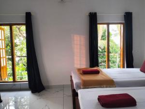 Guestland Homestay客房内的一张或多张床位