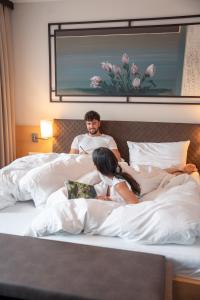 A bed or beds in a room at Hotel Marica