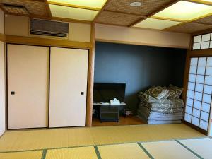 Un lugar para sentarse en 熱海温泉　実の別荘