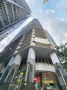 a tall building in the middle of a city at 1 min walk to Lot 10 - Pavilion - Fahrenheit for 1-5px in Kuala Lumpur
