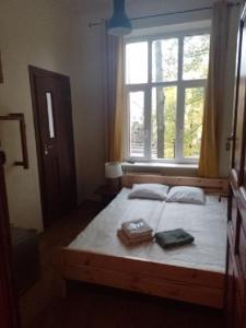 Postel nebo postele na pokoji v ubytování Central Sopot