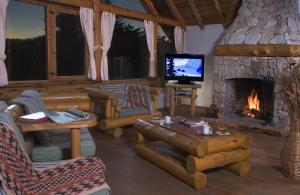 Televisyen dan/atau pusat hiburan di Pillmayken Apart&Spa Mar de las Pampas