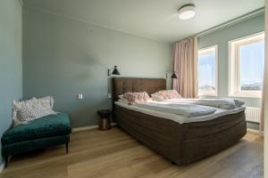 Postel nebo postele na pokoji v ubytování Bardufoss Hotell