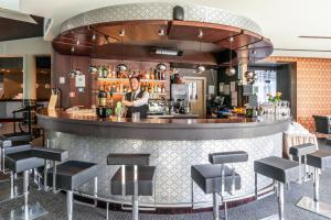 Majoituspaikan Rixwell Elefant Hotel baari tai lounge-tila