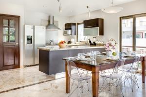 Køkken eller tekøkken på Paseo Luxury Suites