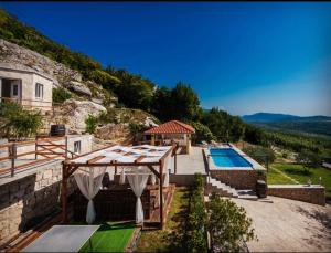 an image of a villa with a swimming pool at Villa Tea in Cavtat