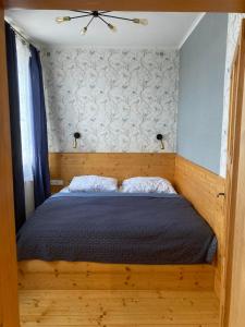 Uma cama ou camas num quarto em Apartmány Štěpánkova 85