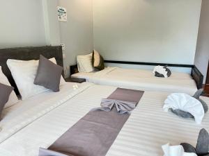 Letto o letti in una camera di Baan Check In