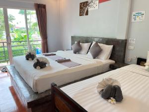 Letto o letti in una camera di Baan Check In