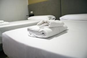 Posteľ alebo postele v izbe v ubytovaní Hostal Valdepeñas by Bossh! Hotels