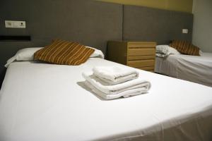 Posteľ alebo postele v izbe v ubytovaní Hostal Valdepeñas by Bossh! Hotels