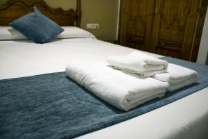Posteľ alebo postele v izbe v ubytovaní Hostal Valdepeñas by Bossh! Hotels