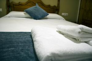 Posteľ alebo postele v izbe v ubytovaní Hostal Valdepeñas by Bossh! Hotels