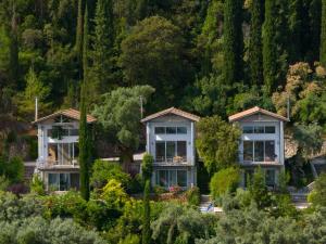a house in the middle of a forest at Ionian Dream Villas in Lefkada Town