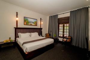 Postel nebo postele na pokoji v ubytování Hotel Nippon Colombo + 37 fotografií