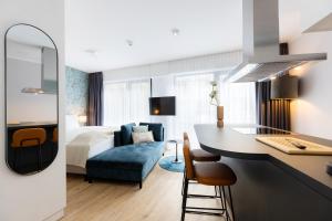 Cama ou camas em um quarto em The Doorman Goethe Frankfurt am Main