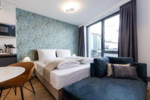 Cama ou camas em um quarto em The Doorman Goethe Frankfurt am Main