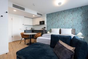 Cama ou camas em um quarto em The Doorman Goethe Frankfurt am Main