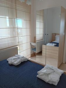 Postel nebo postele na pokoji v ubytování WING 3 apartman ,,BC ,,