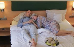 Postel nebo postele na pokoji v ubytování Hotel Barbara