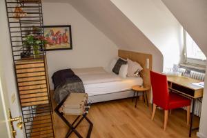 Postel nebo postele na pokoji v ubytování Hotel Barbara