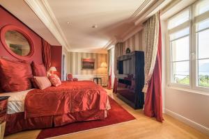 Postel nebo postele na pokoji v ubytování Grand Hotel du Lac - Relais & Châteaux