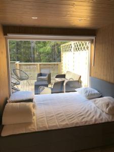 Postelja oz. postelje v sobi nastanitve Furukrona - Private Glass Dome, Sauna and Hot Tub!
