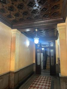 an empty hallway in a building with a ceiling at Hostal New Dream Madrid in Madrid