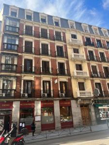 a large building on the corner of a street at Hostal New Dream Madrid in Madrid