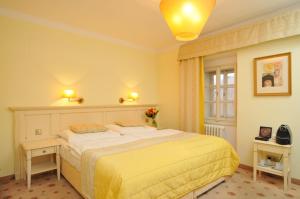Postel nebo postele na pokoji v ubytování Hotel Metamorphis