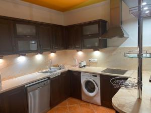 Kuchyň nebo kuchyňský kout v ubytování Arsenal sorházi apartman