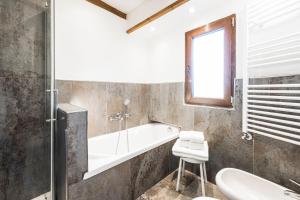 Koupelna v ubytování Hotel Vescovi + 29 fotografií