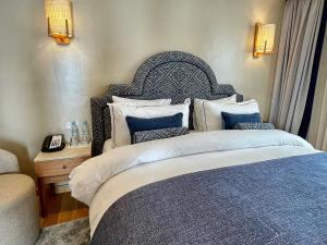 Postel nebo postele na pokoji v ubytování Hôtel Club Val d'Anfa Casablanca Ocean view