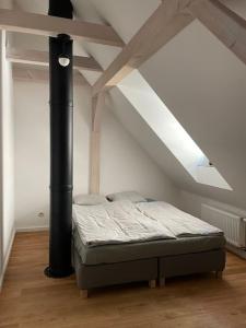 Postel nebo postele na pokoji v ubytování Mezi domky Český Krumlov