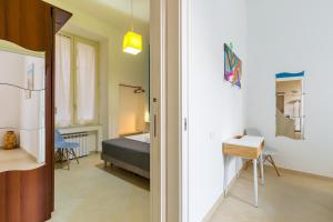 Voodi või voodid majutusasutuse Orsola Comfort House by Napoliapartments toas