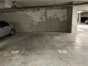 a parking garage with a car parked in it at La Serrisienne 6 - Val d'Europe - Disneyland Paris - 9 Personnes in Chessy