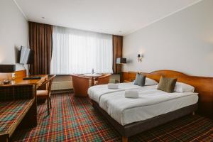 Postel nebo postele na pokoji v ubytování Serwir Hotel + 35 fotografií