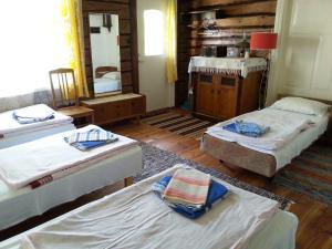 Postel nebo postele na pokoji v ubytování Katri Guesthouse