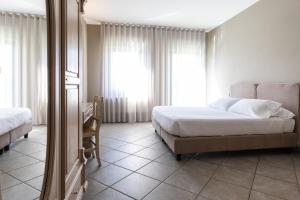 Posteľ alebo postele v izbe v ubytovaní Hotel Don Luis