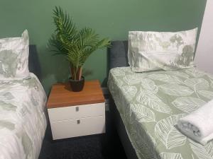 Säng eller sängar i ett rum på One2One - Duplex Relocations