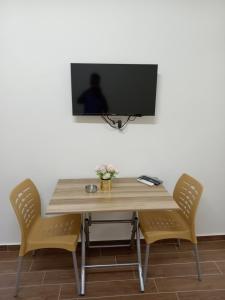 TV a/nebo společenská místnost v ubytování EMILE ALTWAL Madaba