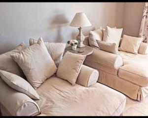 Posezení v ubytování Villa les Deux Cypres